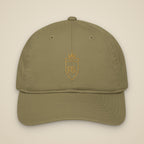 Casquette brodée RS Kaki brodée du monogramme RS, vue de face sur fond pierre — Maison Sahari