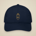 Casquette brodée RS Marine brodée du monogramme RS, vue de face sur fond pierre — Maison Sahari