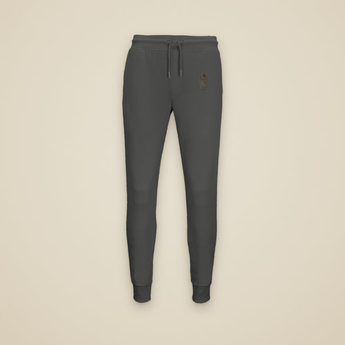 Jogging Anthracite chiné brodé du monogramme RS, vue de face sur fond pierre — Maison Sahari
