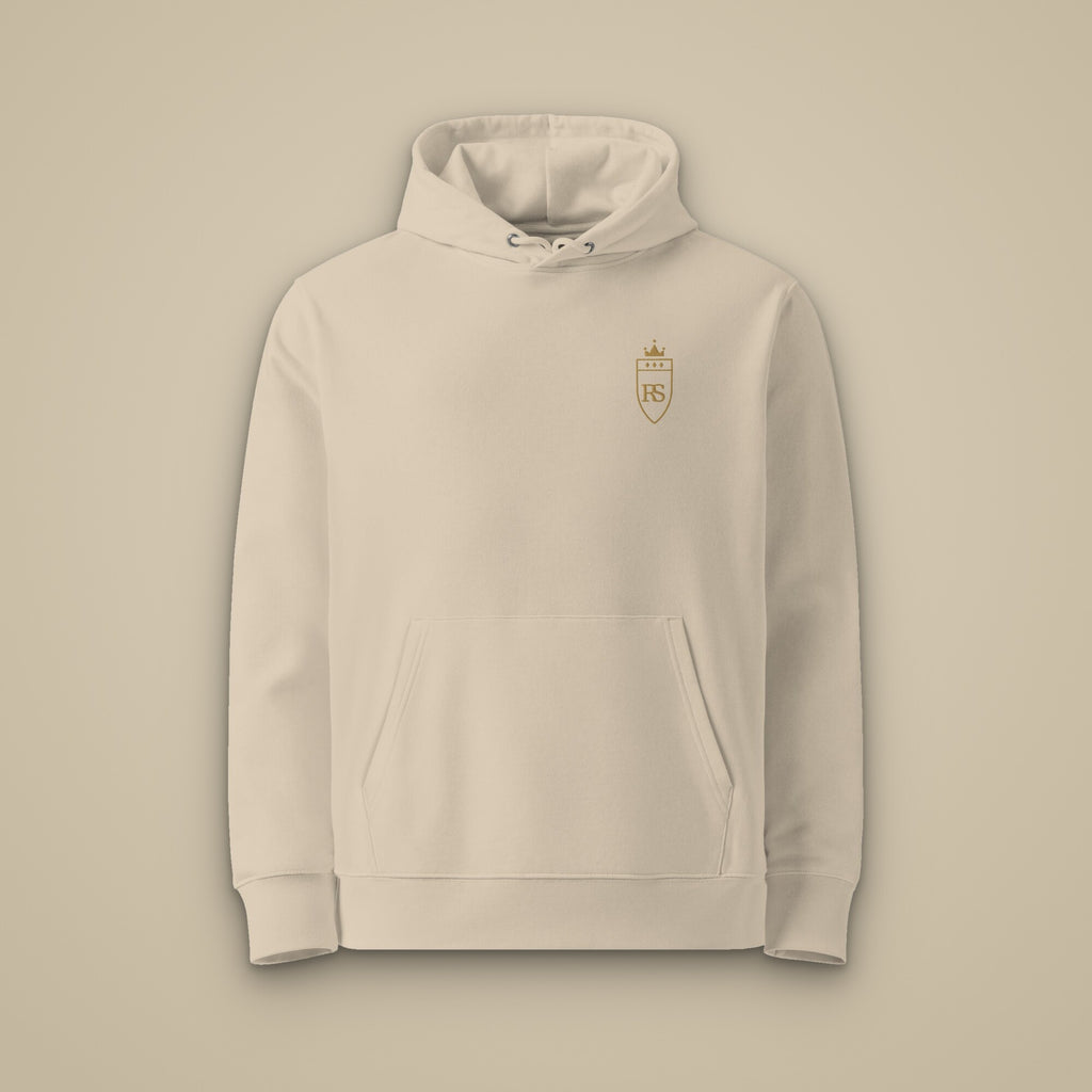 Sweat à capuche Sable brodé du monogramme RS, vue de face sur fond pierre — Maison Sahari