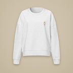 Sweat col rond femme Gris chiné clair brodé du monogramme RS, vue de face sur fond pierre — Maison Sahari