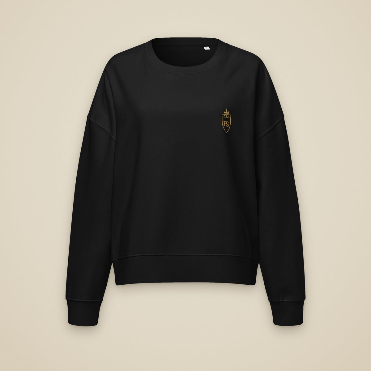 Sweat col rond femme Noir brodé du monogramme RS, vue de face sur fond pierre — Maison Sahari