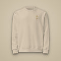Sweat brodé RS Sable brodé du monogramme RS, vue de face sur fond pierre — Maison Sahari