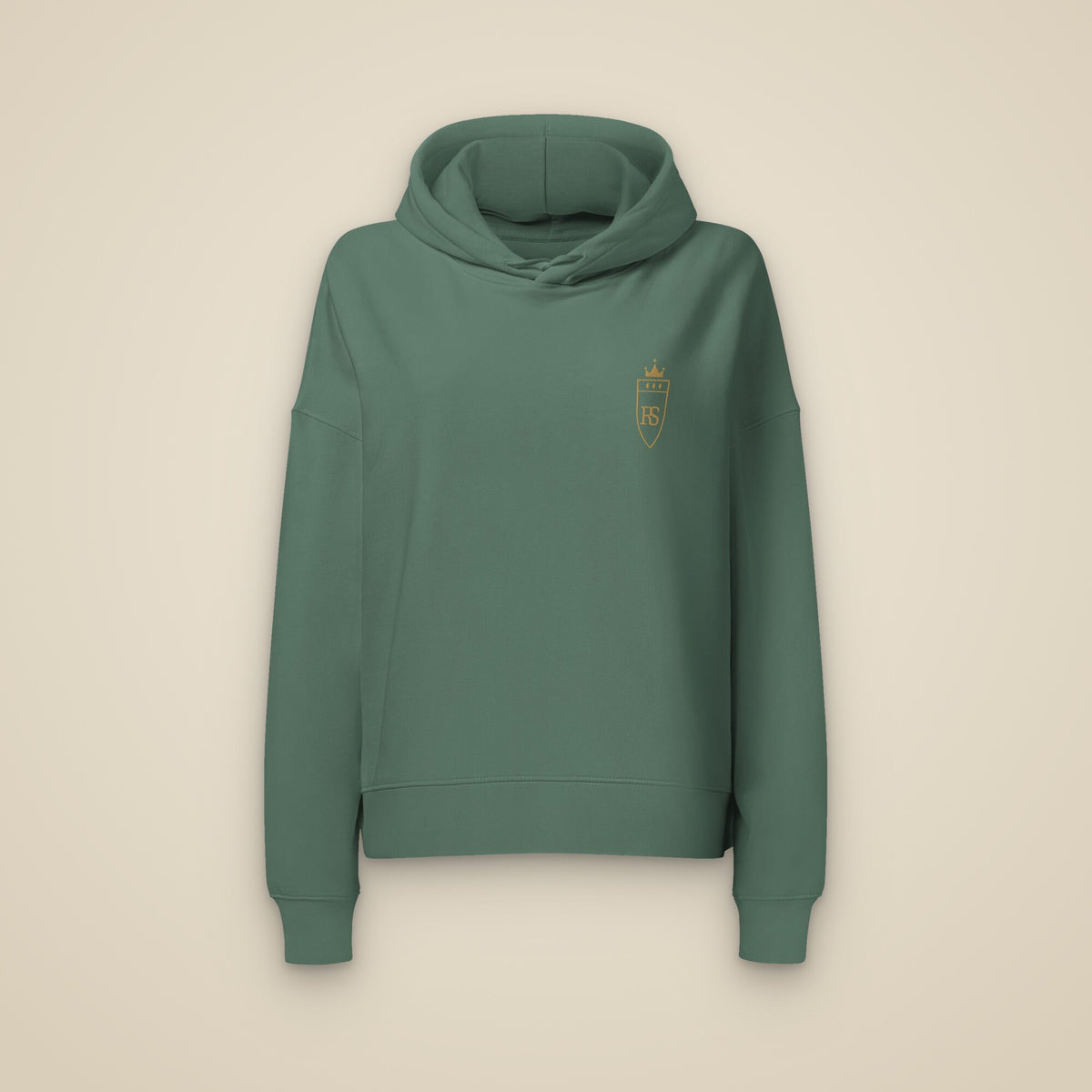 Sweat à capuche femme vert sauge brodé du monogramme RS, vue de face sur fond pierre — Maison Sahari