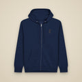 Sweat zippé Marine brodé du monogramme RS, vue de face sur fond pierre — Maison Sahari