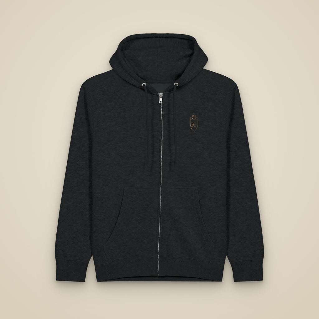 Sweat zippé Noir brodé du monogramme RS, vue de face sur fond pierre — Maison Sahari