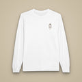 T-shirt à manches longues blanc brodé du monogramme RS, vue de face sur fond pierre — Maison Sahari